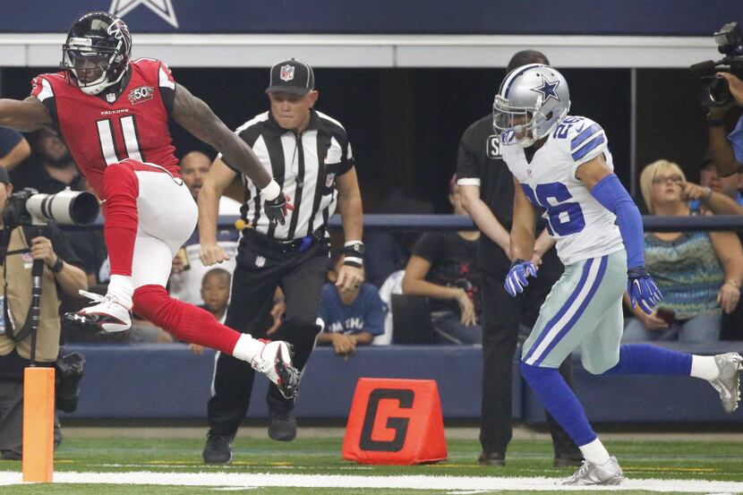 Atlanta Falcons wide receiver Julio Jones (11) crosses into the end zone for a touchdown on...