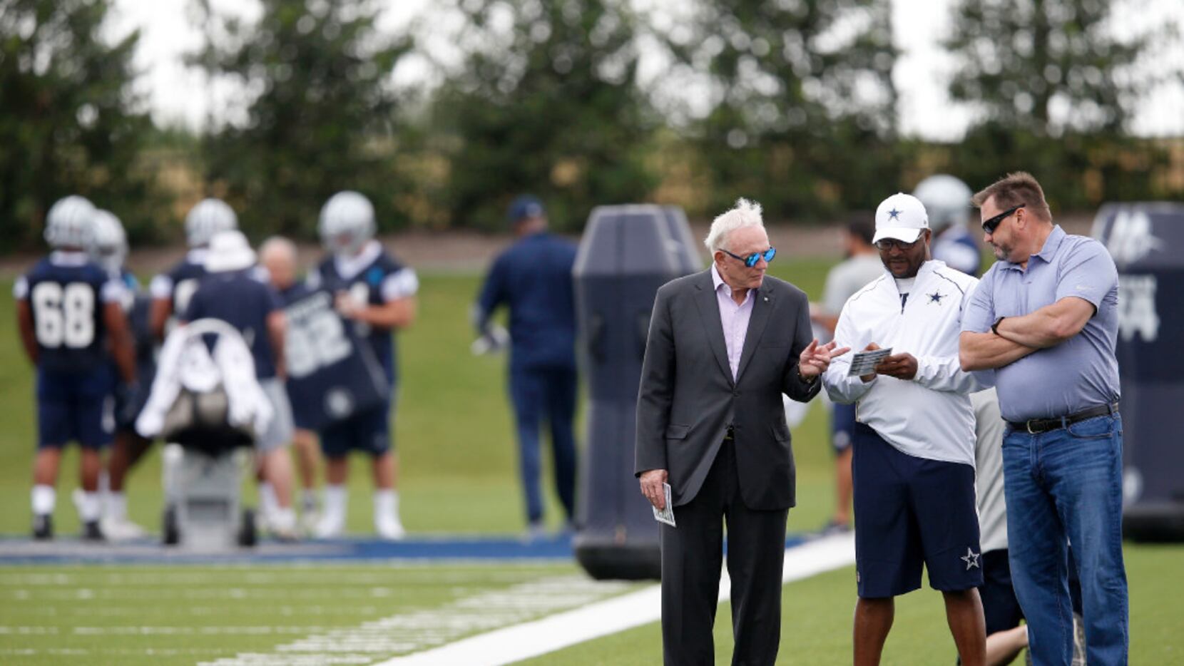 Dallas Cowboys owner and general manager Jerry Jones, Dallas Cowboys Will McClay and Todd...