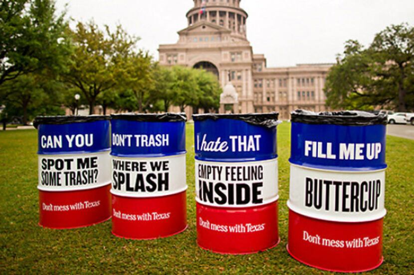 Colorful barrels emblazoned with catchy slogans aimed at getting people to pitch in their...