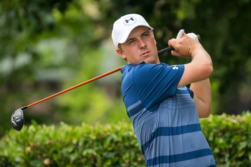 Jordan Spieth watches his shot from the first tee during the final round of the AT&T Byron...