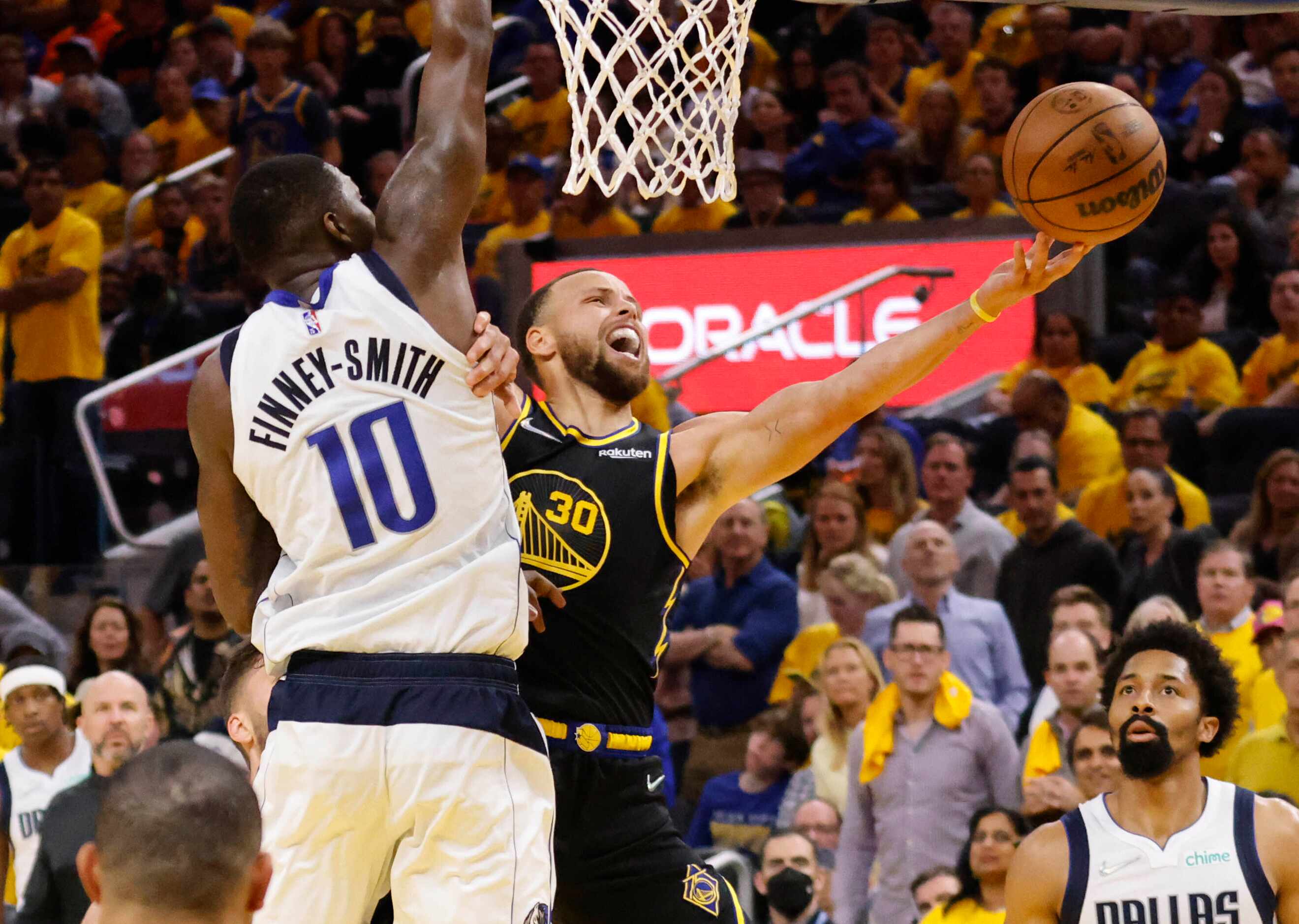 Golden State Warriors guard Stephen Curry (30) attempts a shot as Dallas Mavericks forward...
