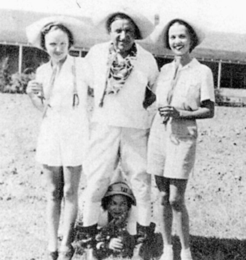 Clint Murchison SR. clowning with friends at his compound on Matagorda Island.