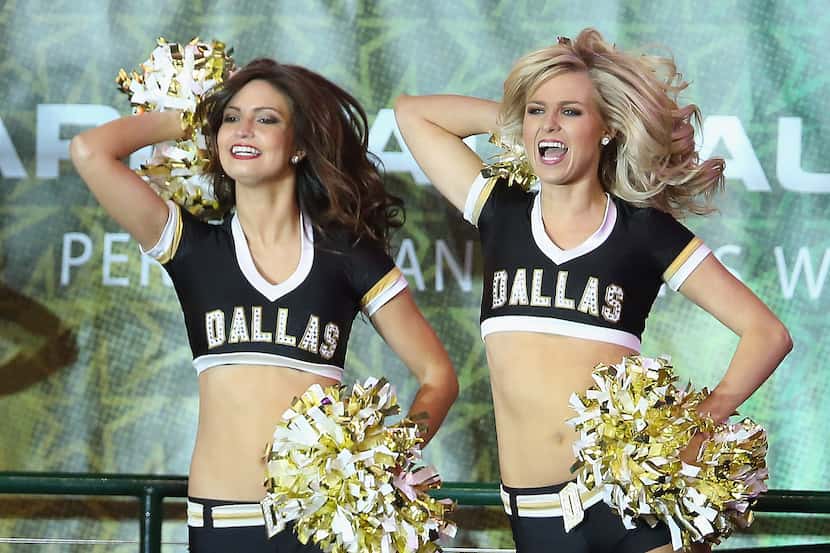 DALLAS, TX - FEBRUARY 08:  The Dallas Stars ice girls cheer at American Airlines Center on...
