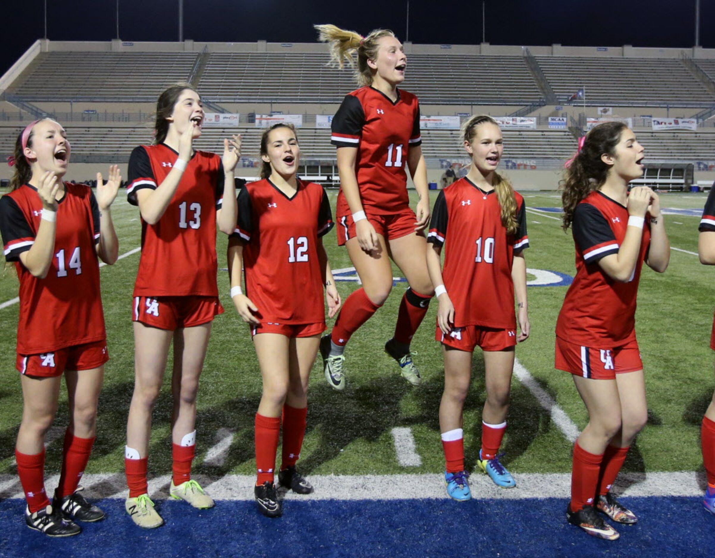 Ursuline Academys Elli Brunts (11) leaps in the air as they are crowned Division 1 TAPPS...