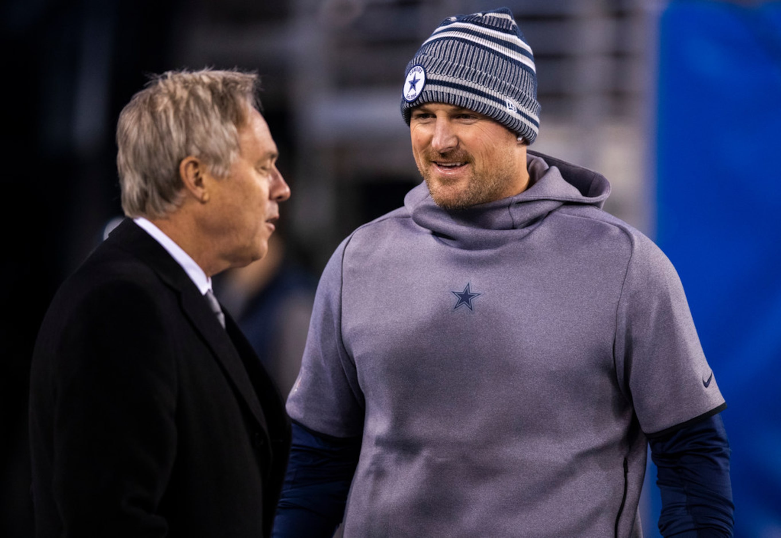 Dallas Cowboys tight end Jason Witten (82) talks with Senior Vice President of public...