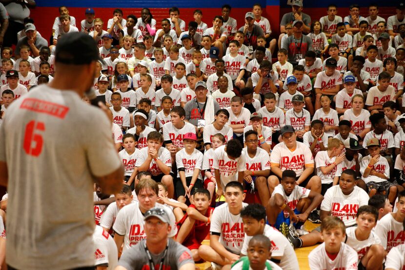 Dallas Cowboys quarterback Dak Prescott (4) talks to the 720 camp goers at the Dak Prescott...