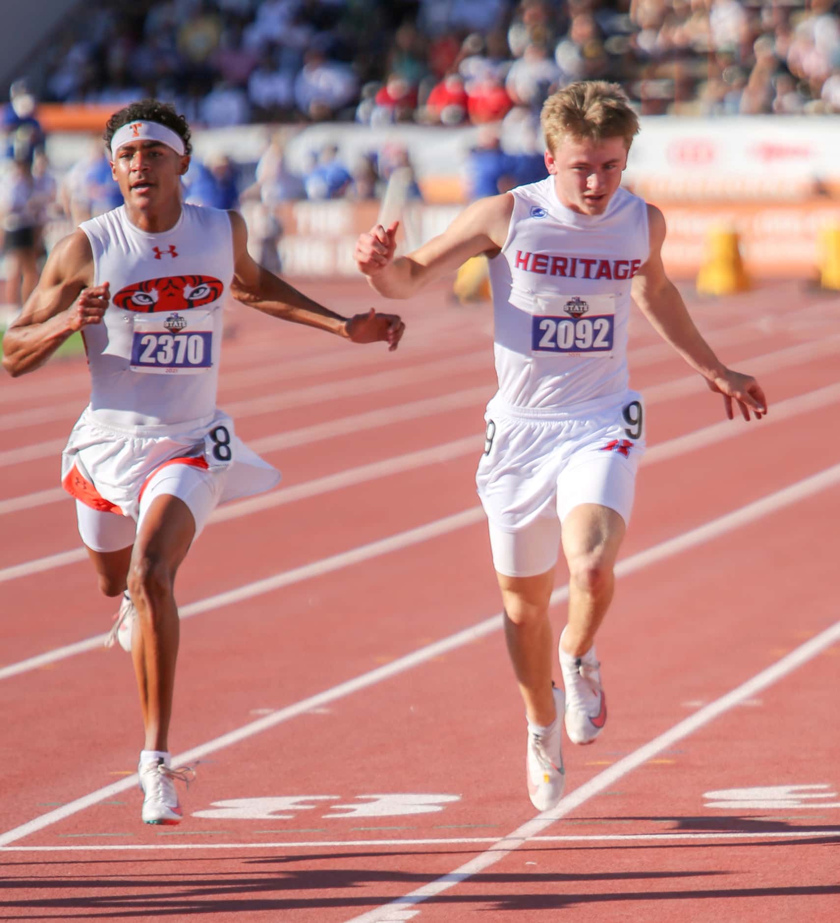 Midlothian Heritage's Carter Wilkerson runs towards the finish line during his 4A boys 100...