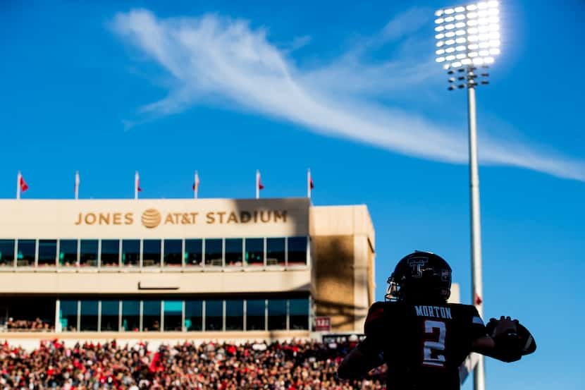 LUBBOCK, TEXAS - OCTOBER 14: Behren Morton #2 of the Texas Tech Red Raiders throws a warmup...