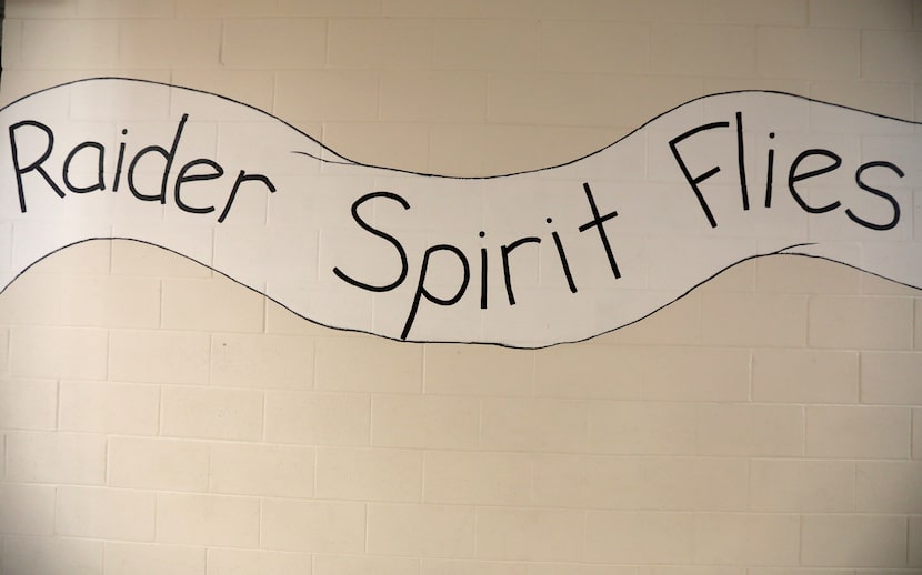 An old sign on the wall at the Sunnyvale district offices, which used to be a K-8 school, in...