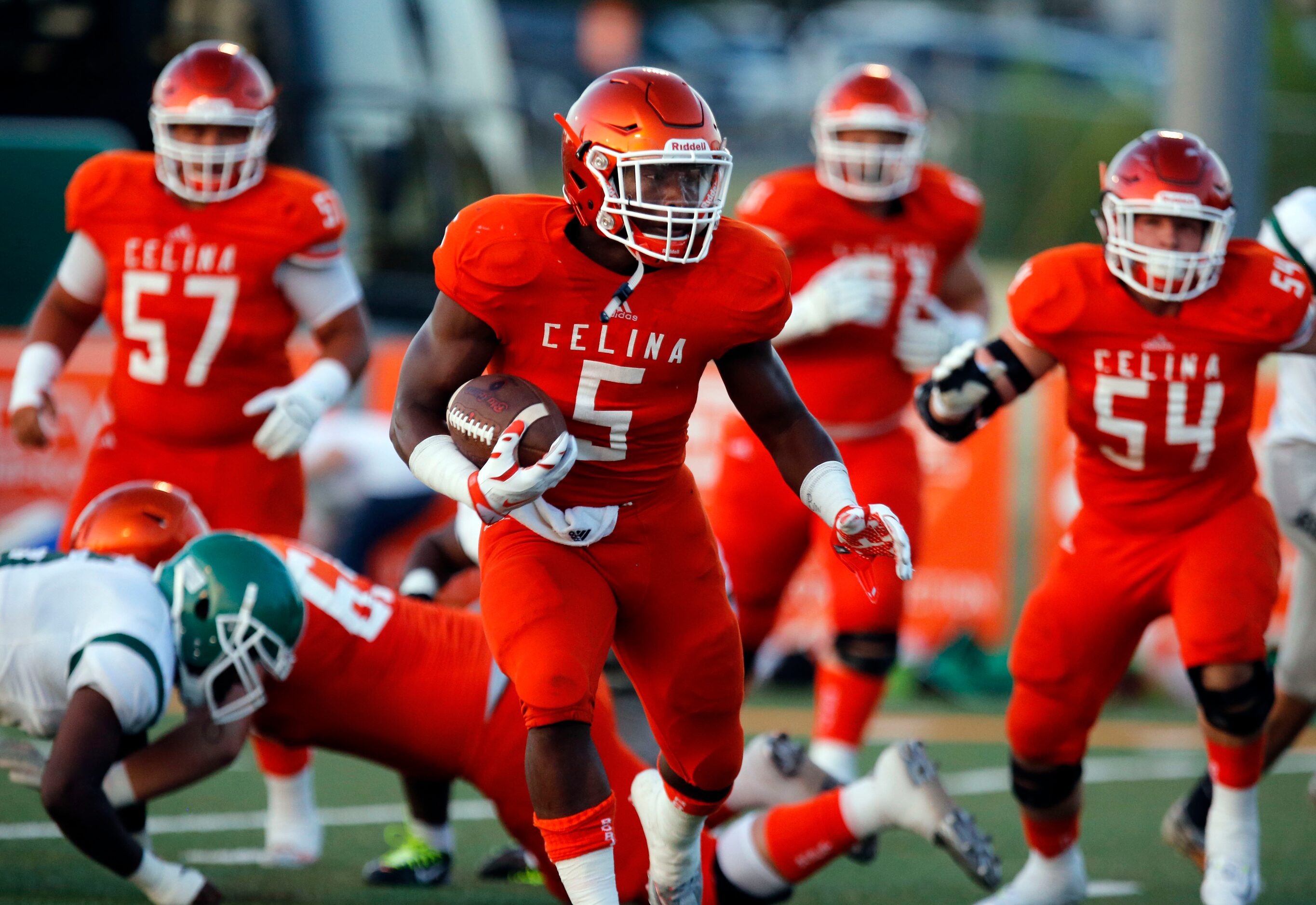 (TXHSFB) Celina High RB Jarren Alexander (5) cuts back and heads to the end zone for a...