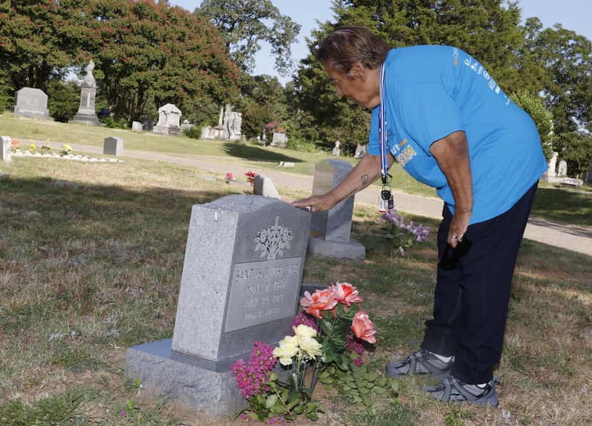 Bessie Rodriguez, mother to 12-year-old Santos Rodriguez, at her son's grave site in 2015