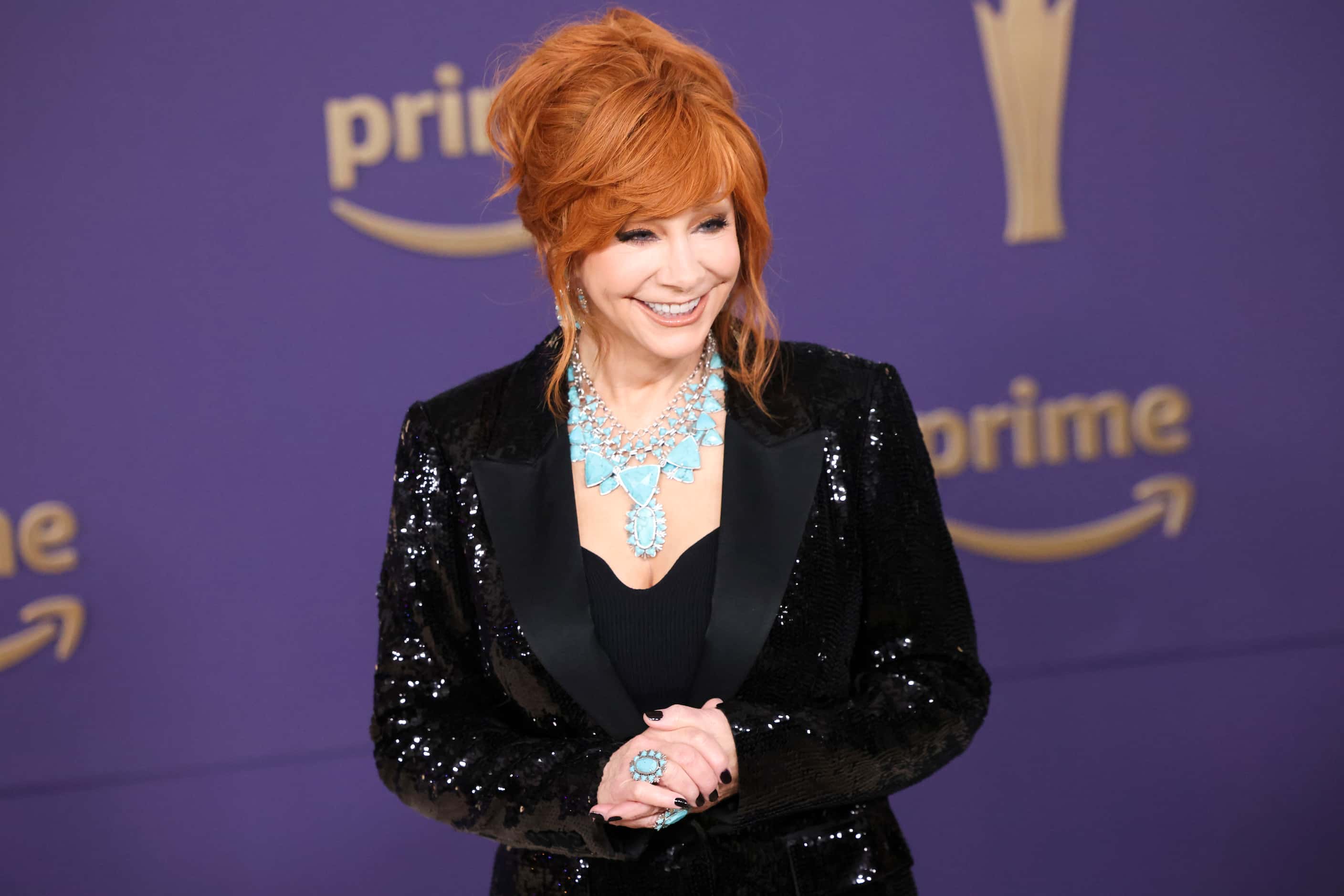 Reba McEntire arrives at the 59th Academy of Country Music Awards red carpet on on Thursday,...