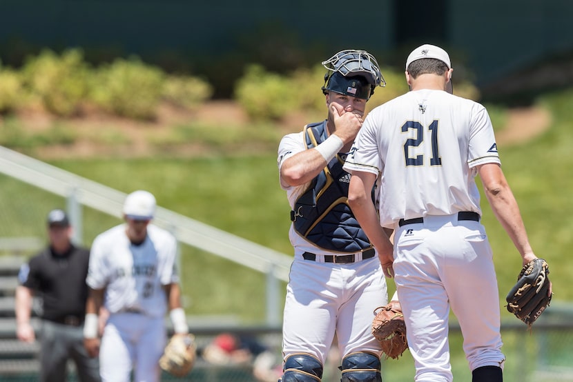 Georgia Tech catcher Joey Bart (9) talks with pitcher Brant Hurter (21) as Texas Rangers...