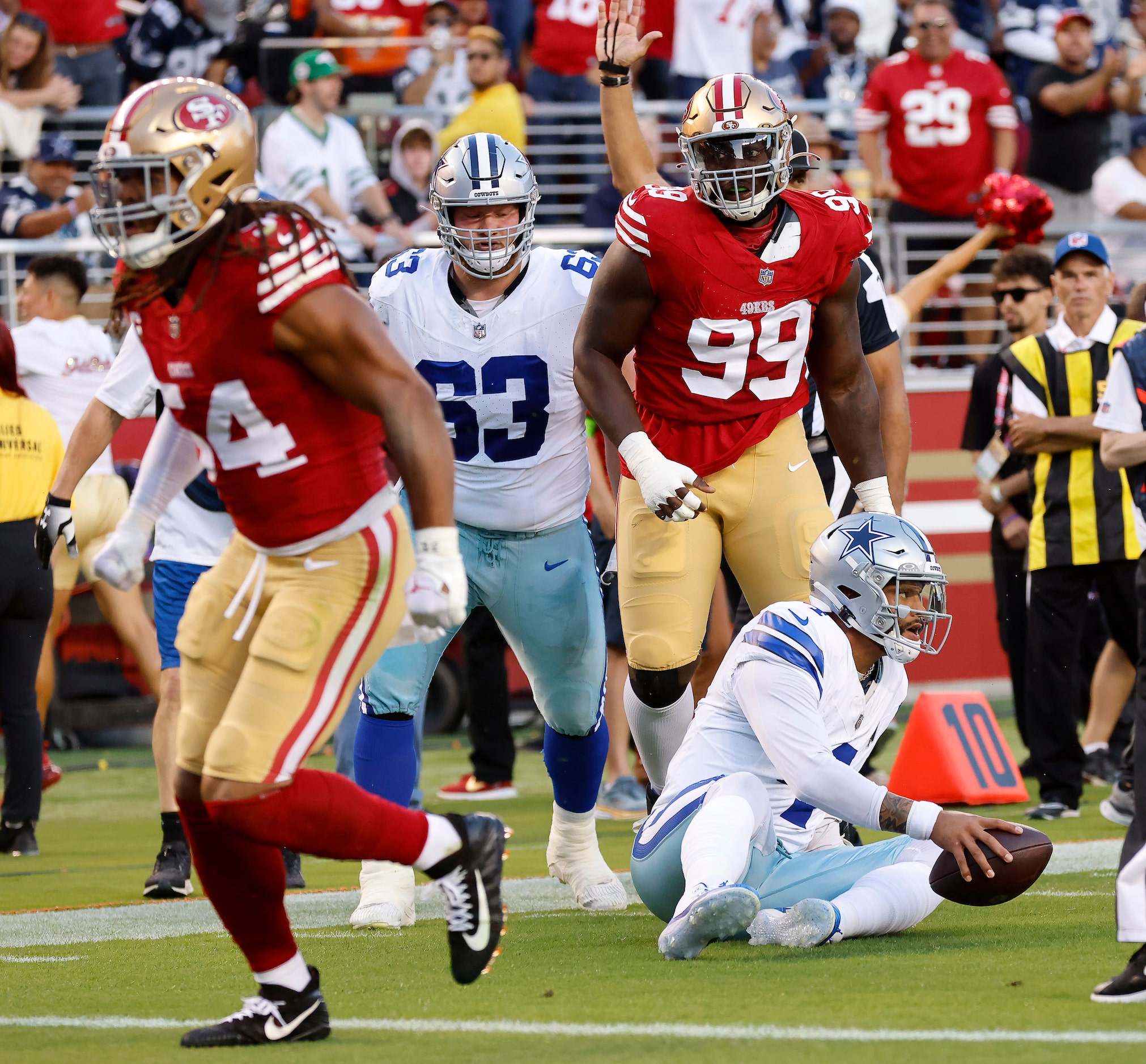 Dallas Cowboys quarterback Dak Prescott (4) is sacked by San Francisco 49ers linebacker Fred...