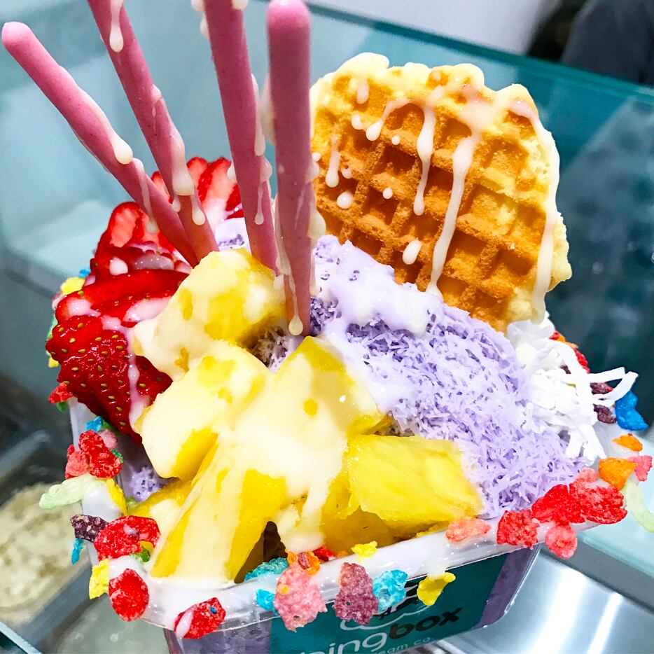 Taro snow cream with pineapple, Fruity Pebbles, strawberries, coconut flakes, a waffle...