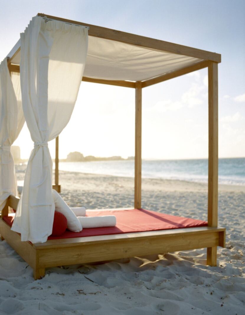 A beach bed at the Grace Bay Resorts  has a new partnership with celebrity interior...