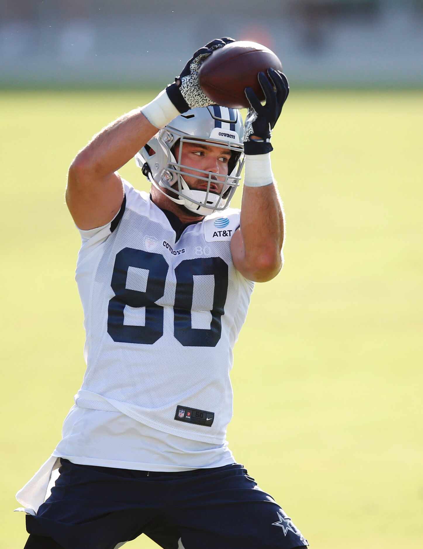 Dallas Cowboys tight end Blake Bell (80) catches a pass during the first day of training...