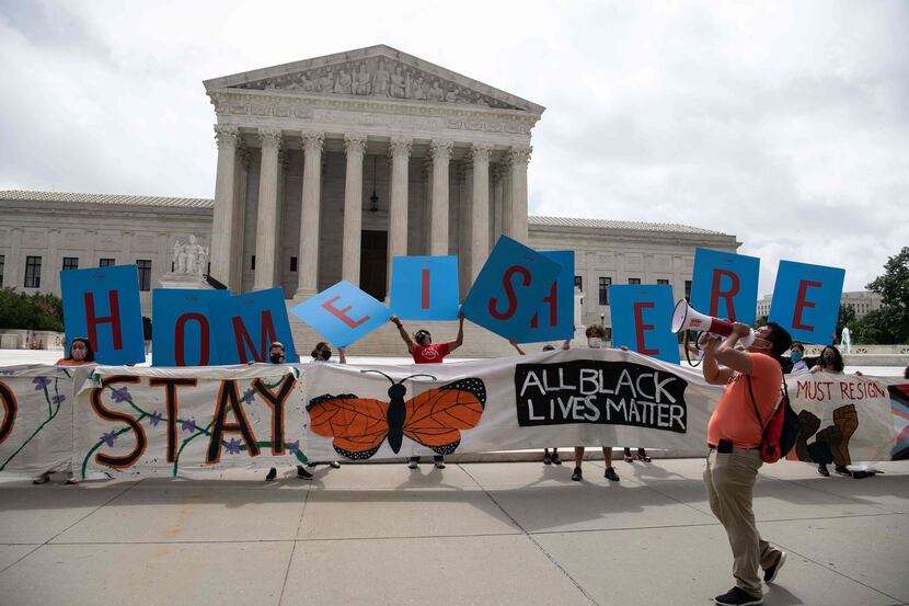 Activists hold a banner in front of the US Supreme Court in Washington, DC, on June 18,...