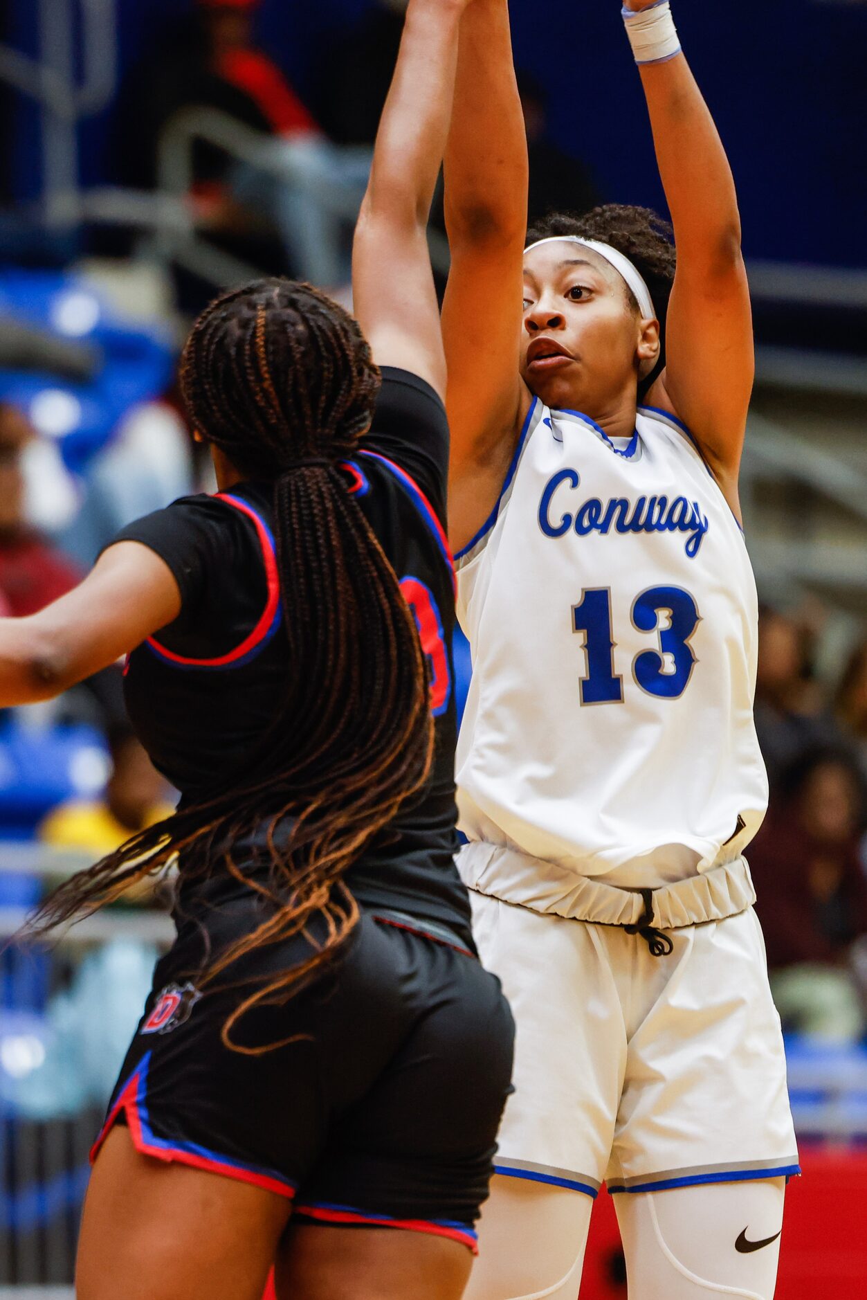 Conway Lady Cats Chloe Clardy (13) goes for a shot against Duncanville Pantherettes' Mariah...