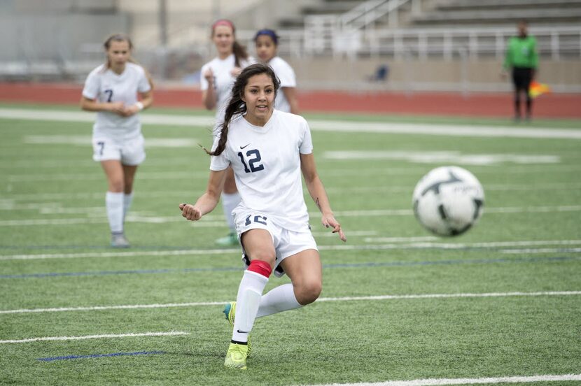 Frisco Centennial junior forward Katelyn Termini (12) watches her tie-breaking penalty kick...