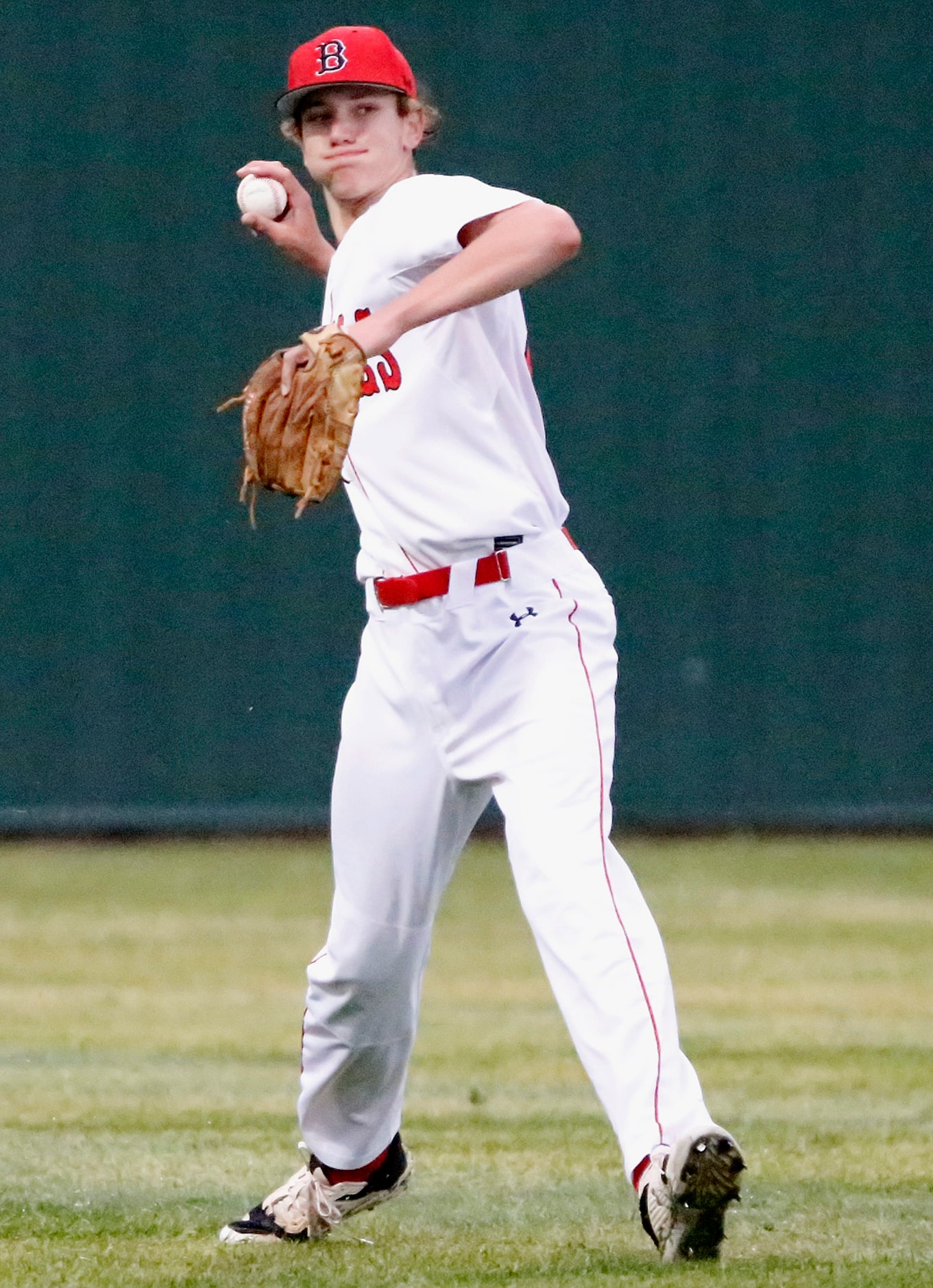 Braswell left fielder Sterling Bigley (23) throws back to the infield after fielding a hit...