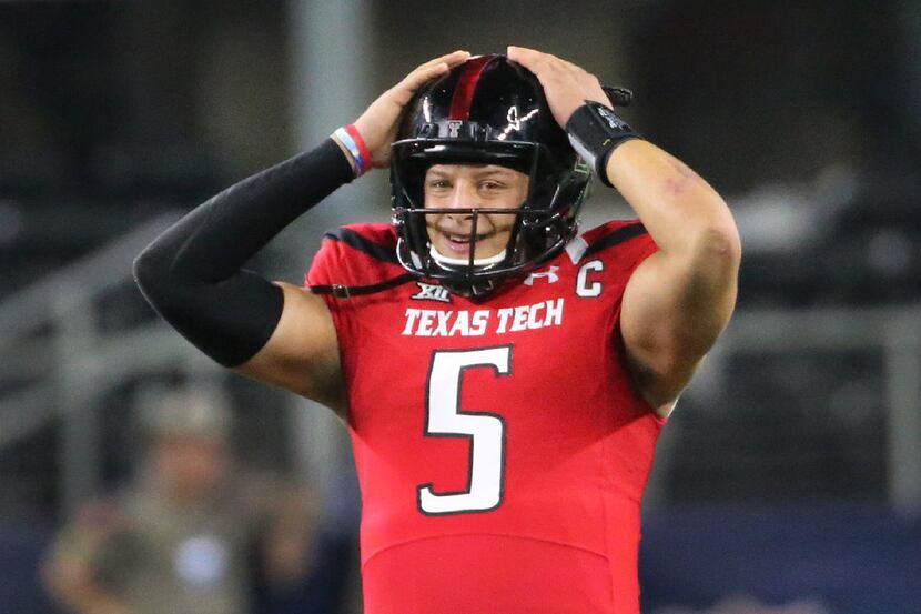 Texas Tech Red Raiders quarterback Patrick Mahomes II (5) reacts to a play on the field in...
