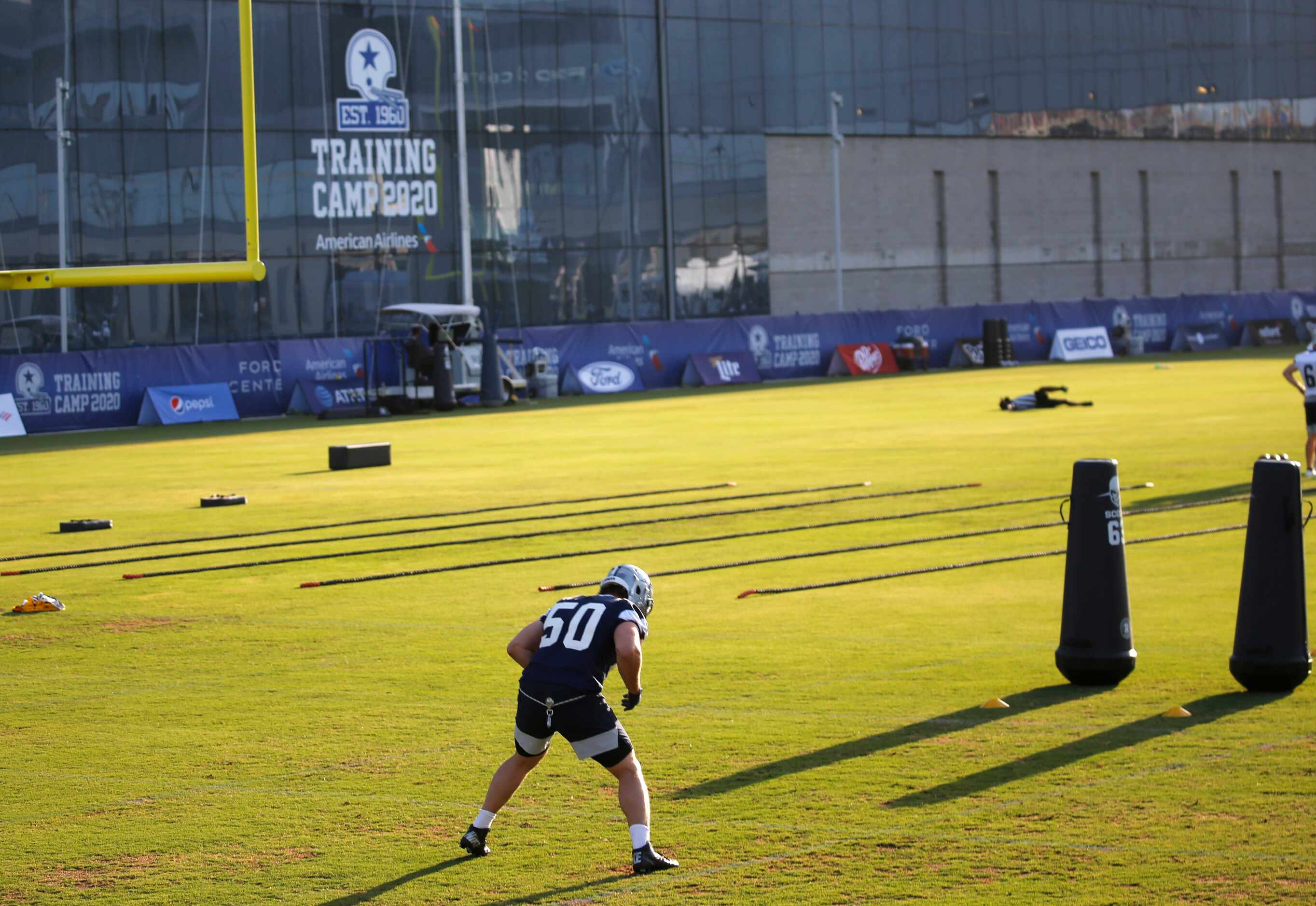 Dallas Cowboys linebacker Sean Lee (50) works out during the first day of training camp at...