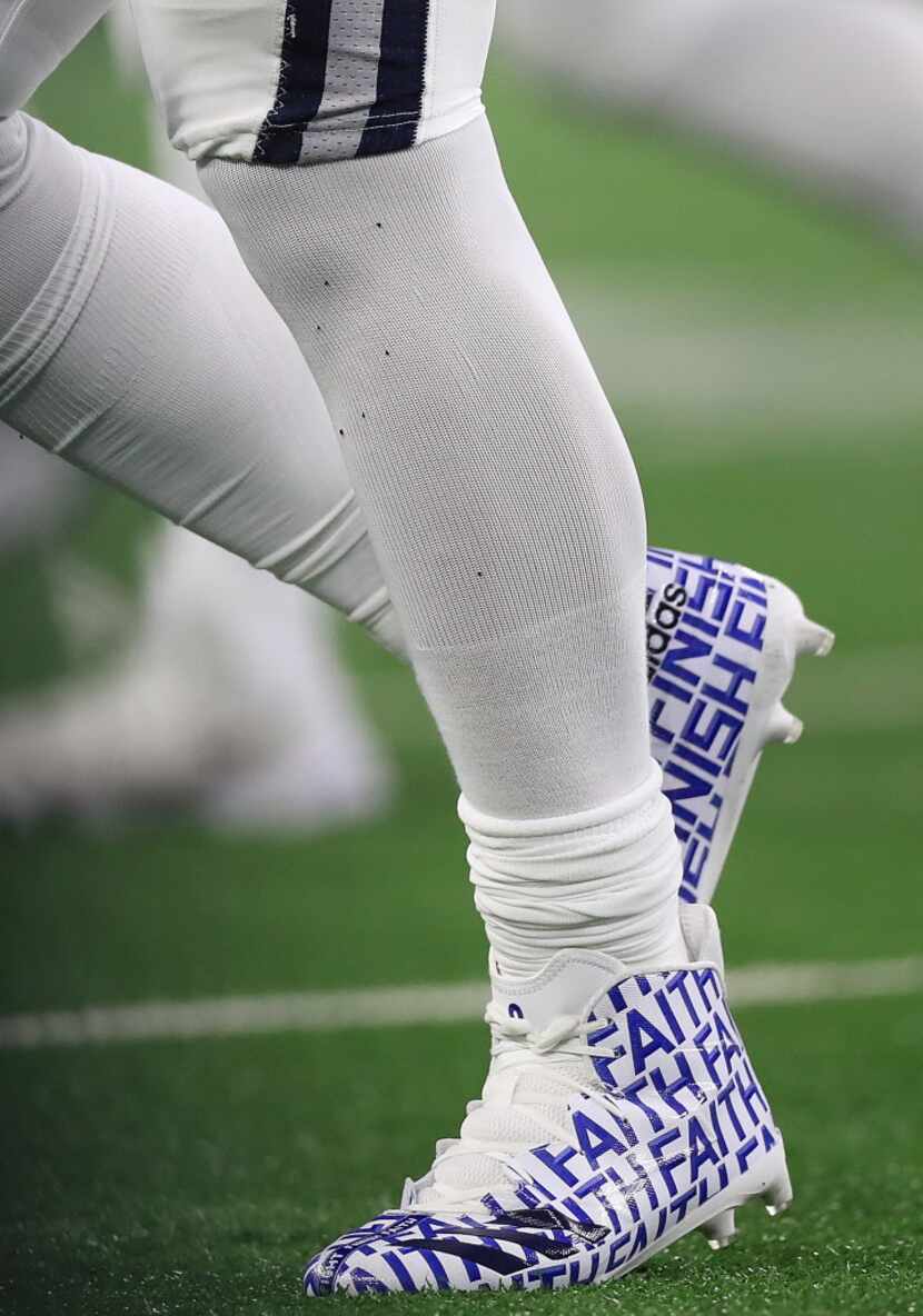 ARLINGTON, TX - NOVEMBER 30:  The Adidas cleats of Dak Prescott #4 of the Dallas Cowboys...