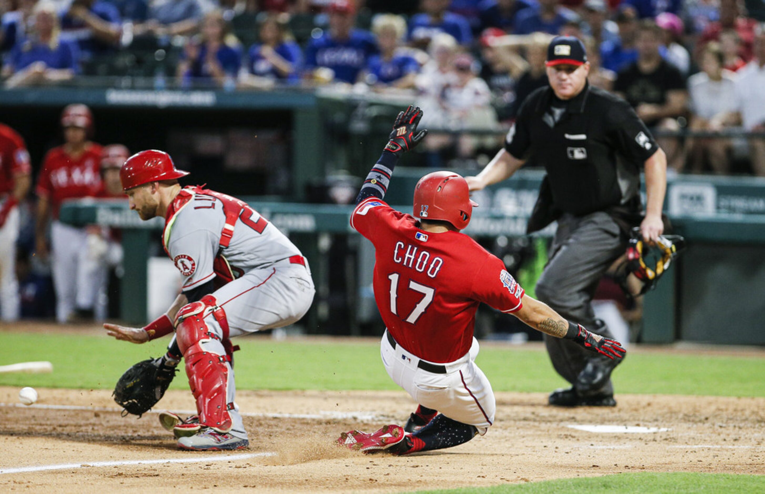 ARLINGTON, TX - JULY 4: Jonathan Lucroy #20 of the Los Angeles Angels of Anaheim catches the...