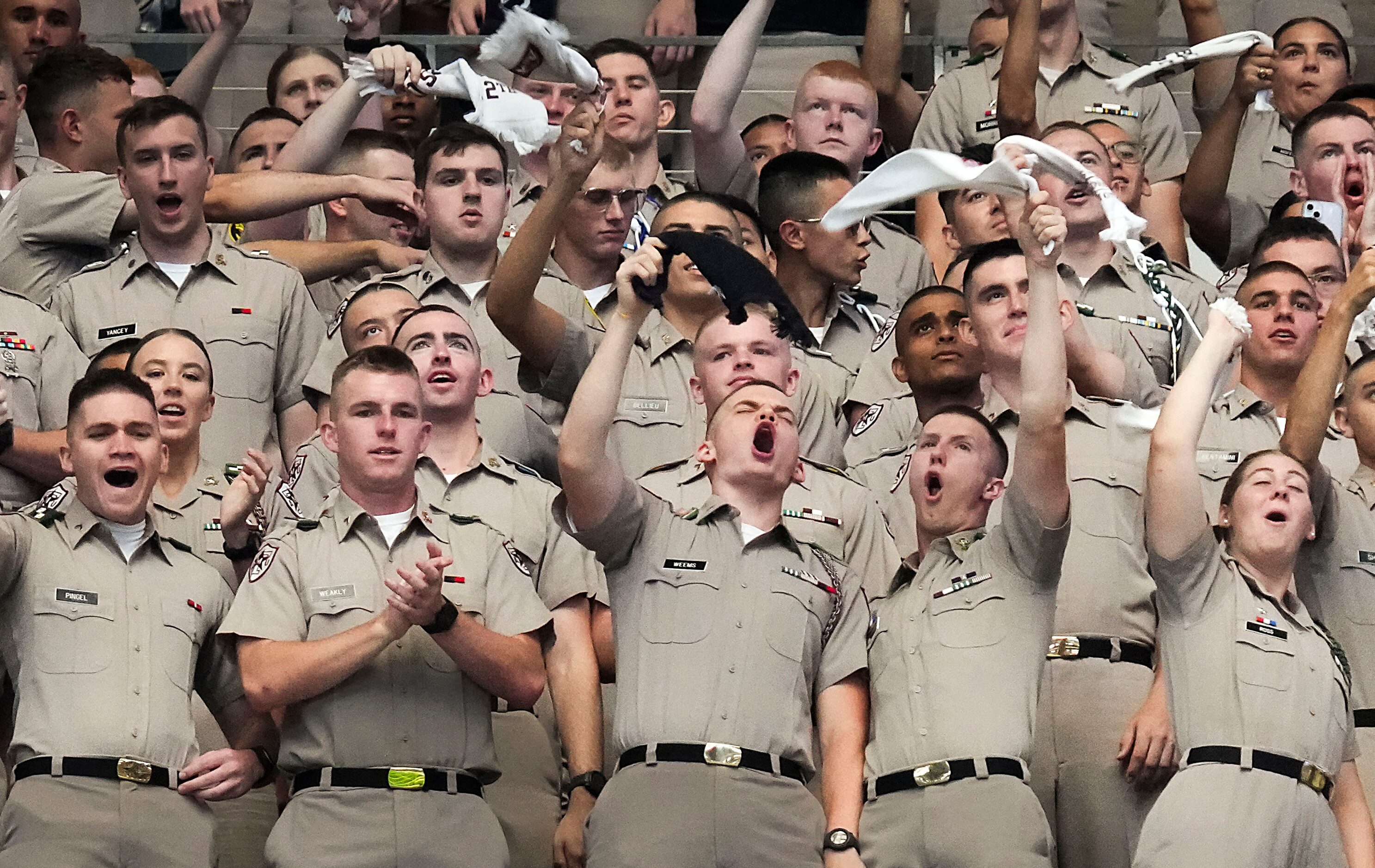 Members of the Texas A&M Corps Of Cadets cheer their team before an NCAA football game...