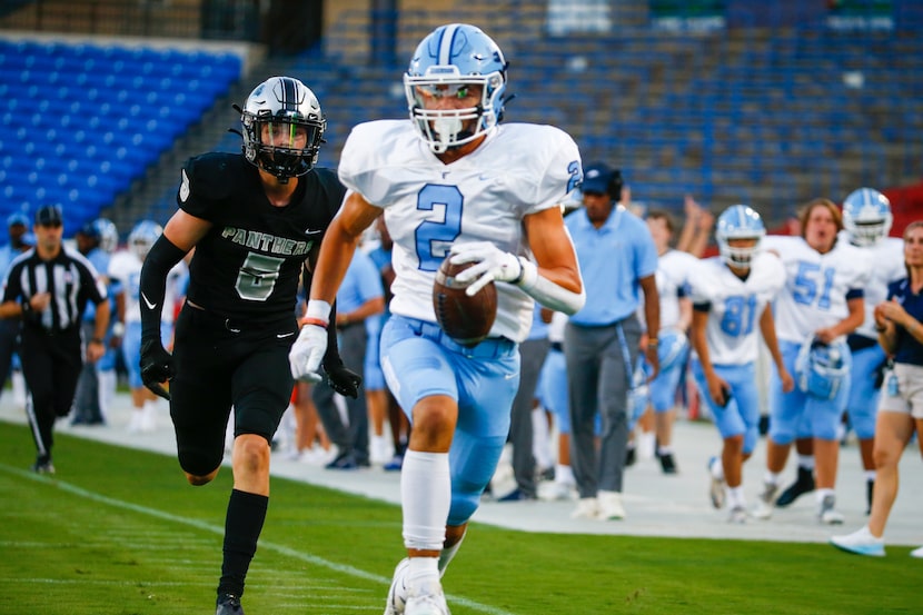 Emerson Mavericks wide receiver Kylen Evans (2) ran into the end zone for a touchdown during...