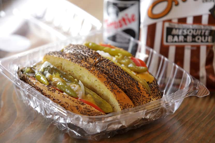 The Chicago Dogs “Let’s Play Two” is a pair of loaded hot dogs served at New York Sub.