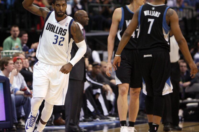 Dallas Mavericks shooting guard O.J. Mayo (32) reacts to making a three-pointer against the...