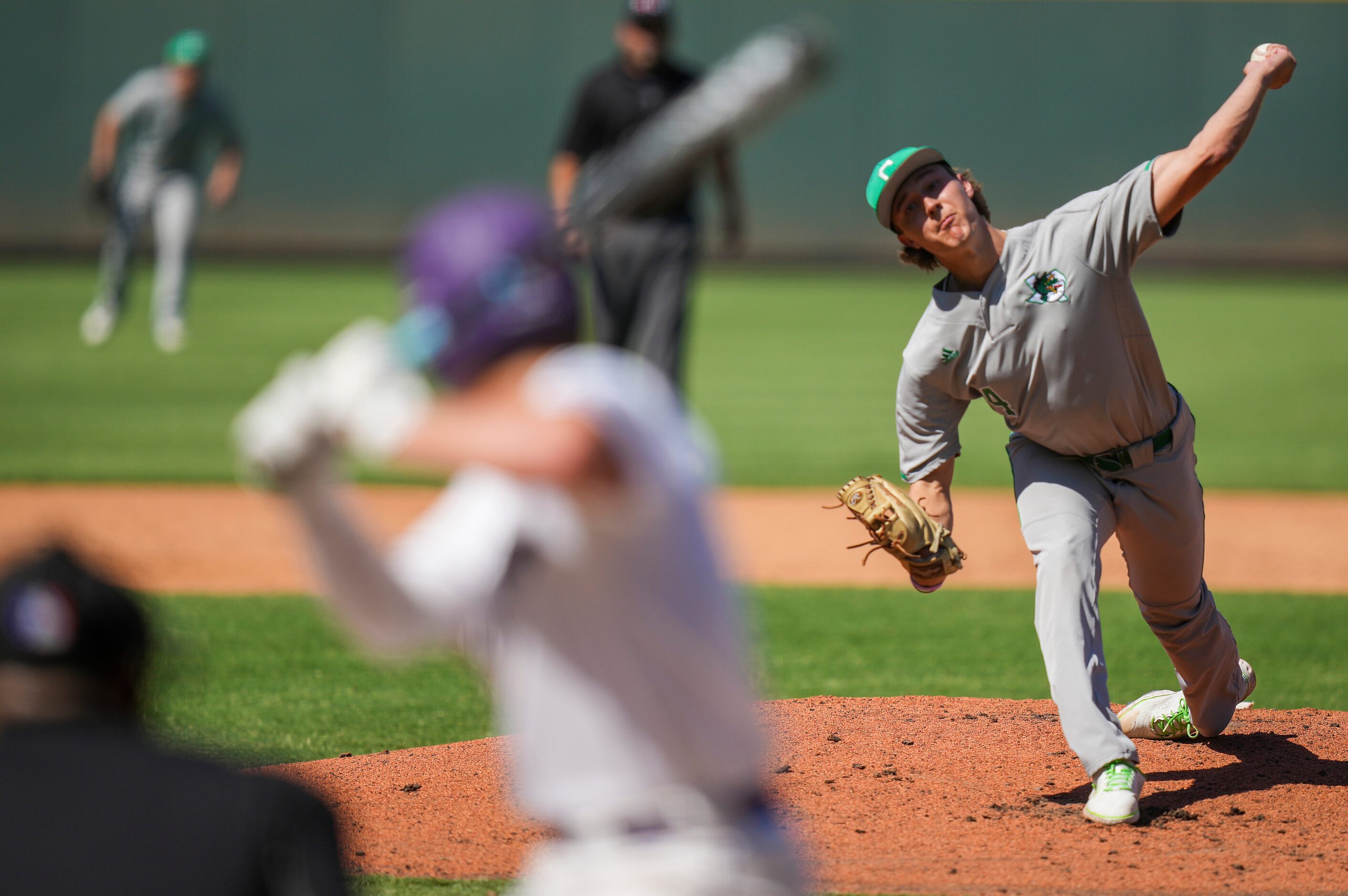 Southlake Carroll pitcher Griffin Herring delivers during the first inning of a UIL 6A...