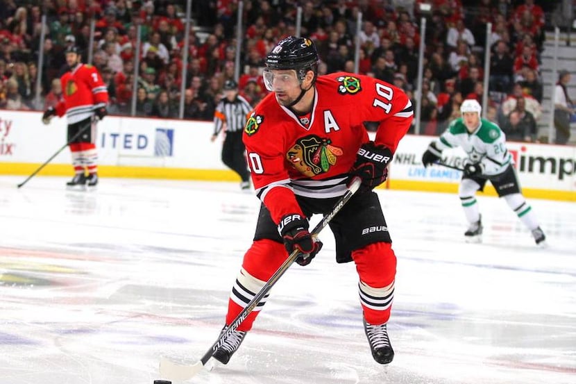 Jan 4, 2015; Chicago, IL, USA; Chicago Blackhawks left wing Patrick Sharp (10) with the puck...