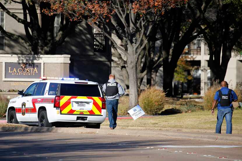 Plano police near the entrance to La Costa apartments near the intersection of Ohio and...