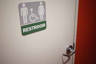 (FILES) This file photo taken on May 05, 2016 shows A gender neutral bathroom  in...