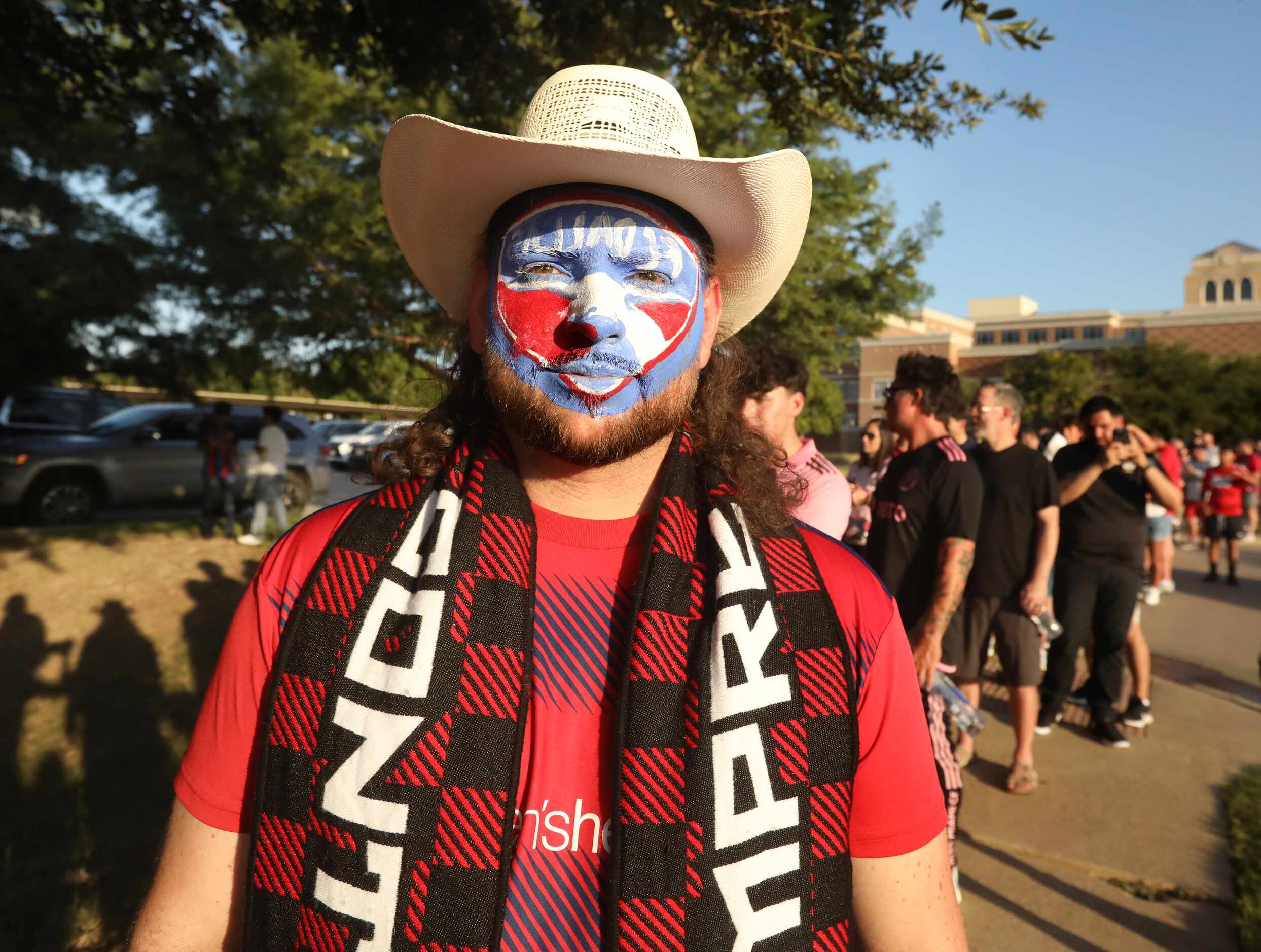 Federico Burch poses for a photograph as he waits for the gates to open for an FC Dallas...