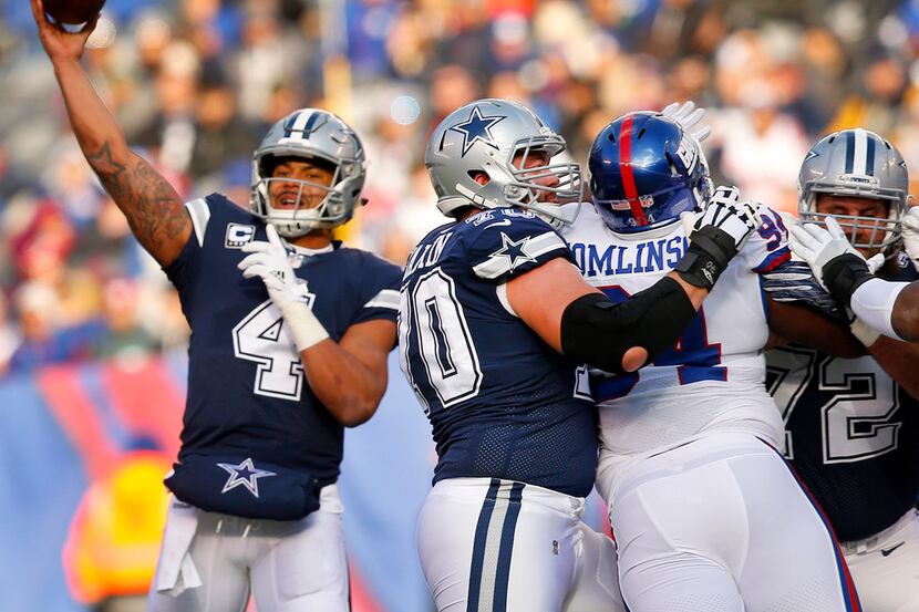 Dallas Cowboys offensive guard Zack Martin (70) makes a block on New York Giants defensive...