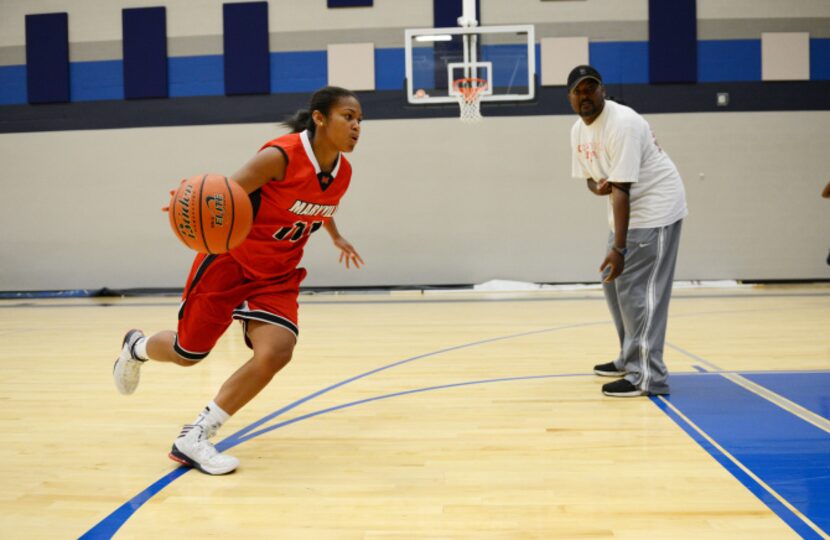 Junior basketball player Jazmin Shields practices in one of the new gyms at Wylie East High...