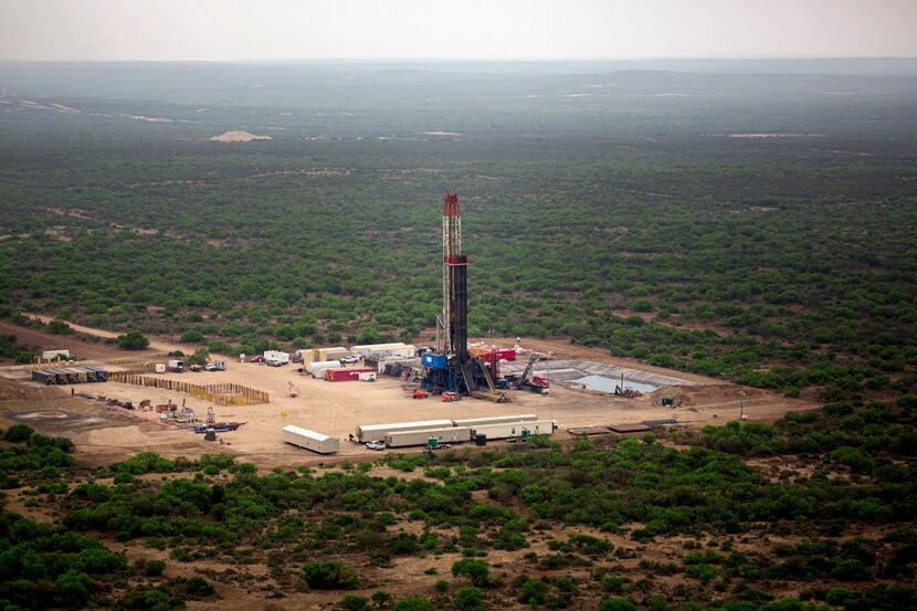  A natural gas drilling site stands in the middle of Webb County in 2014. T (G.J....