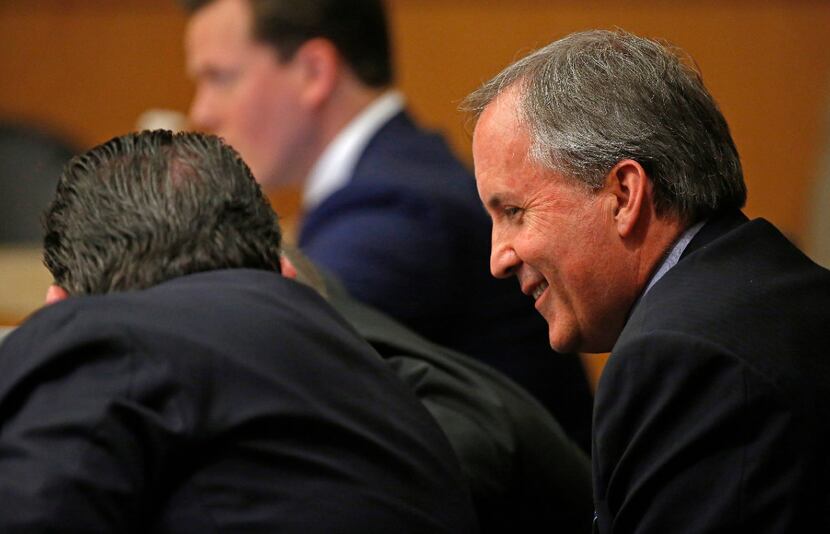 In this Feb. 16 file photo, Texas Attorney General Ken Paxton smiles during his pretrial...