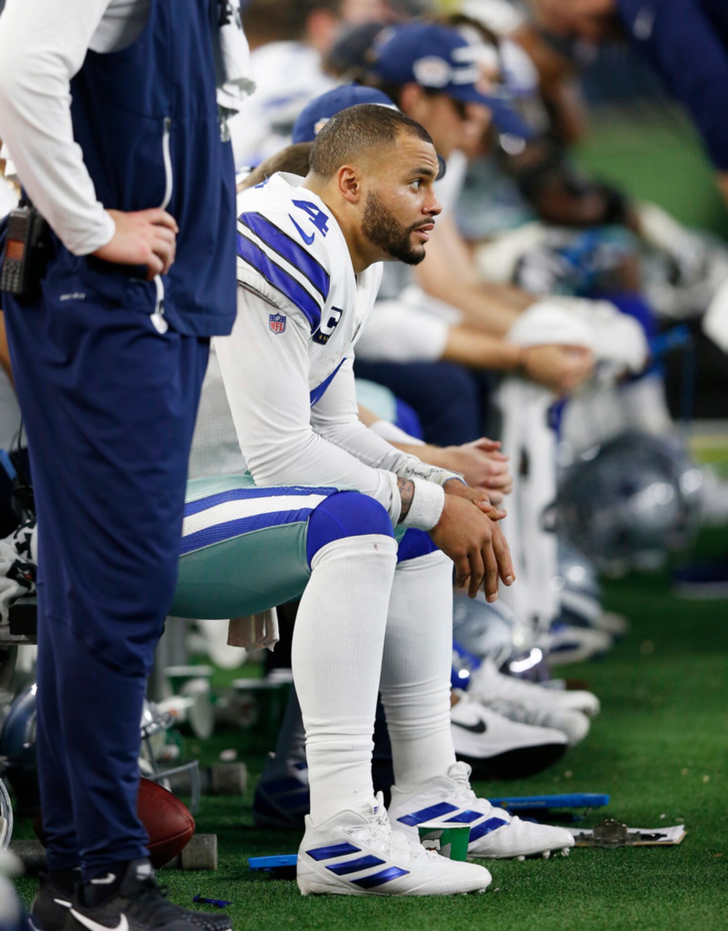 Dallas Cowboys quarterback Dak Prescott (4) on the bench during the second half of play at...