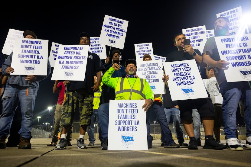 Longshoremen strike at midnight at Bayport Terminal on Tuesday, Oct. 1, 2024, in Houston. 