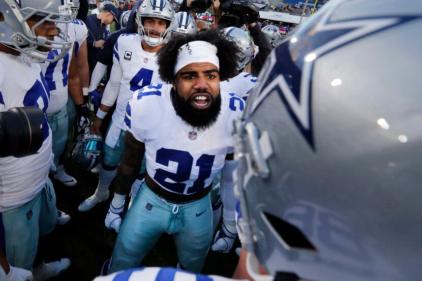 Dallas Cowboys players get fired up by running back Ezekiel Elliott (21) before their NFC...