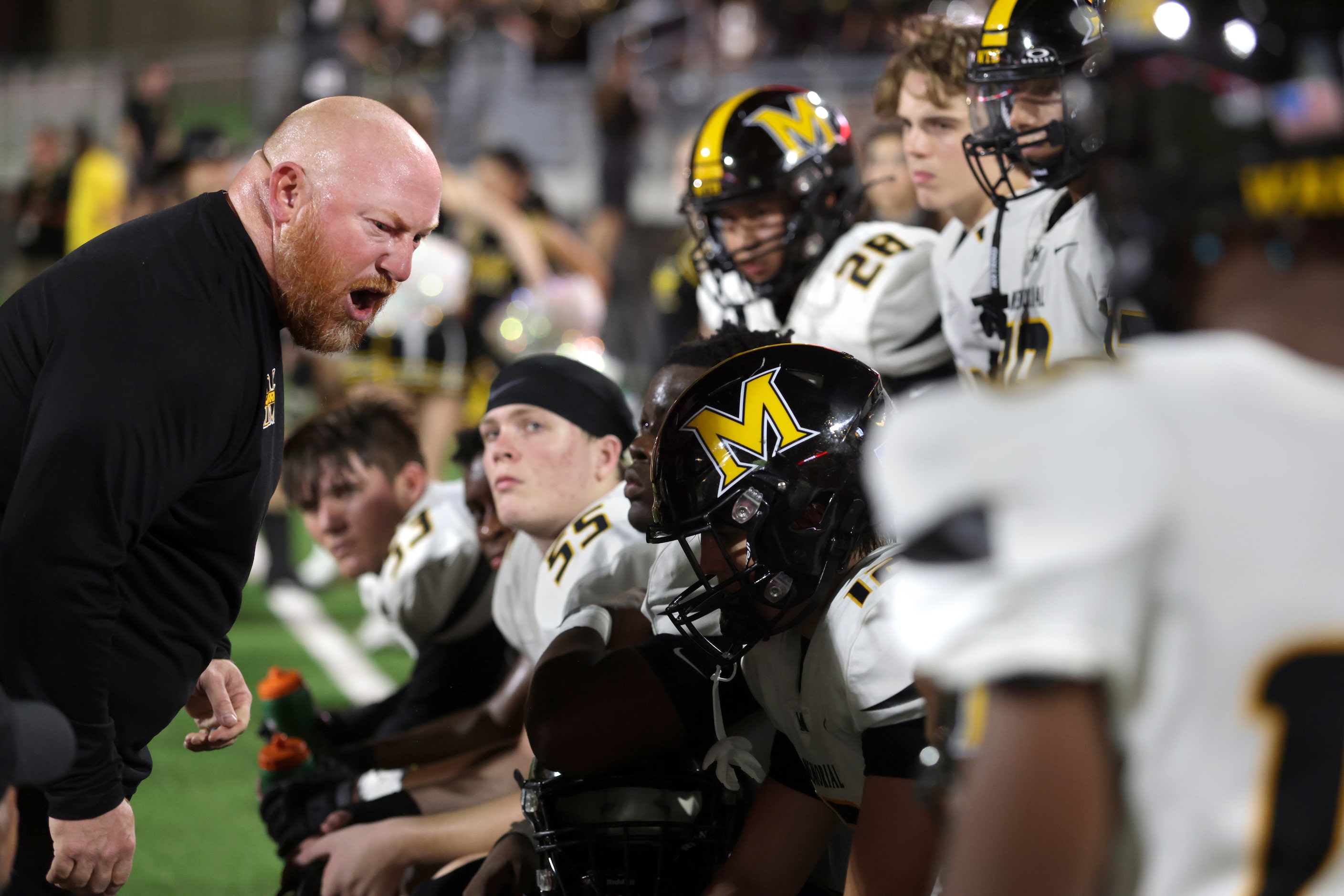 Coach Kirk McBride shows his frustration towards the Memorial players during a timeout...