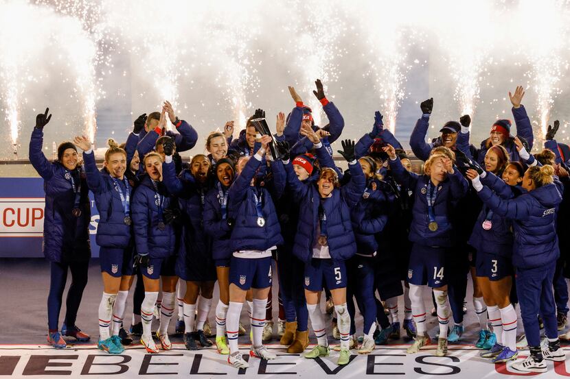 The United States celebrate after defeating Iceland to win the SheBelieves Cup at Toyota...