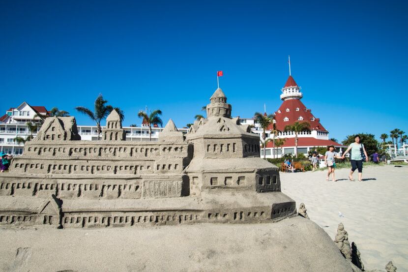 Sandcastles regularly sprout along the beach in from of the Hotel del Coronado, where Frank...