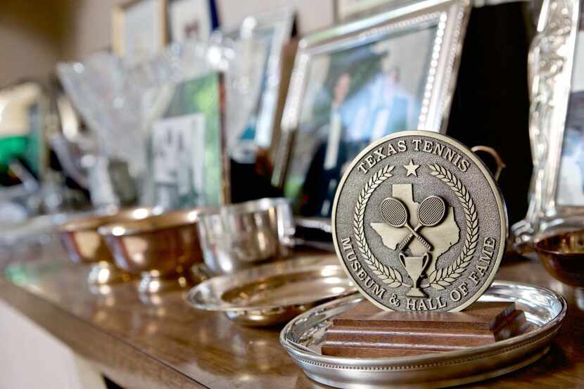 
A medallion from the Texas Tennis Museum dedicated to Nancy Jeffett sits on display at her...