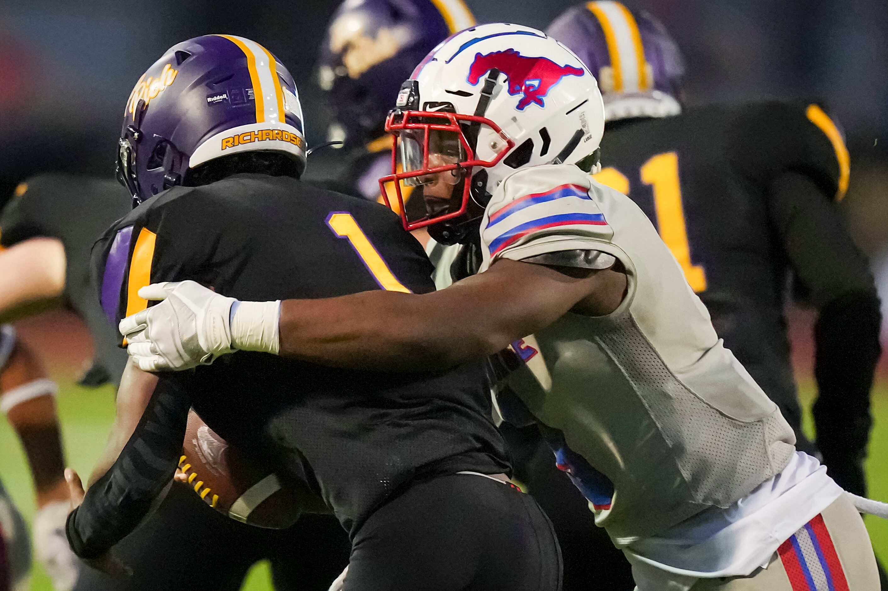 Richardson Pearce defensive lineman Jonathan Agumadu (9) sacks Richardson quarterback Howard...